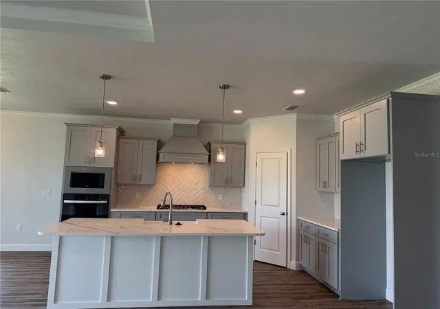 Photo 3 of Single family home for sale at 1130 SW 67th Street, Gainesville, FL 32607 | MLS# GC541187 | Listing updated on 2026-09-11