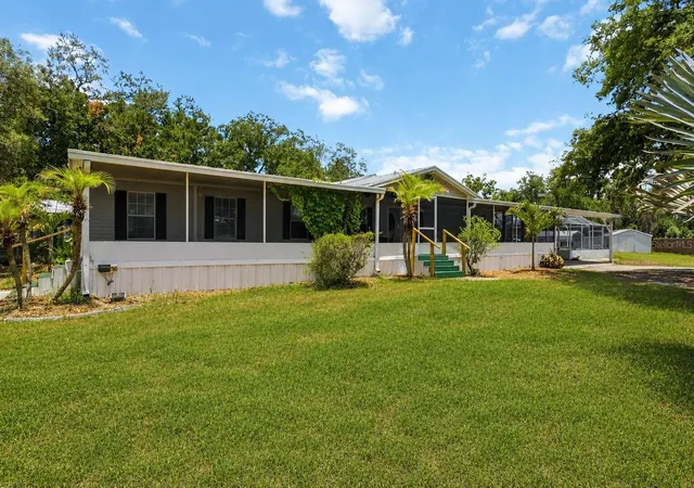 Photo 1 of Manufactured home for sale at 12104 Woodside Dr, Riverview, FL 33579 | MLS# TB8519727 | Listing updated on 2026-09-13