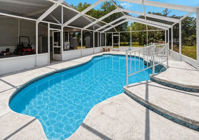 Photo 2 of Manufactured home for sale at 12104 Woodside Dr, Riverview, FL 33579 | MLS# TB8519727 | Listing updated on 2026-09-13