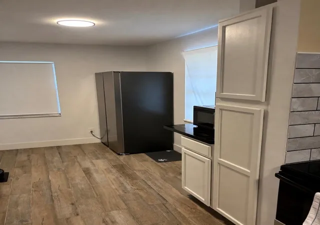 Photo 4 of Single family home for sale at 905 Avenue E NE, Winter Haven, FL 33881 | MLS# TB8520126 | Listing updated on 2026-09-10