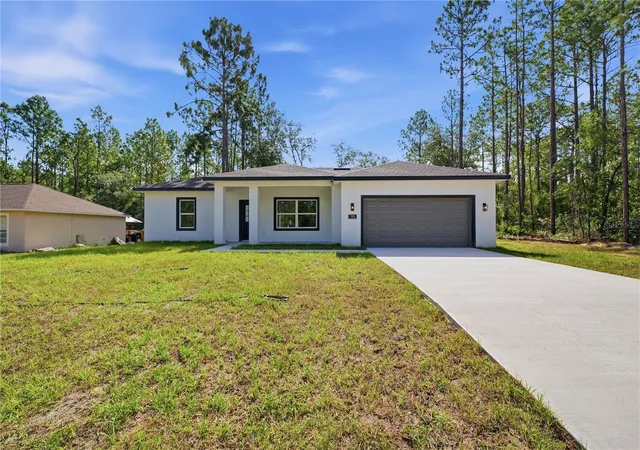 Photo 2 of Single family home for sale at 7605 N Santos Dr, Citrus Springs, FL 34434 | MLS# O6418199 | Listing updated on 2026-10-11