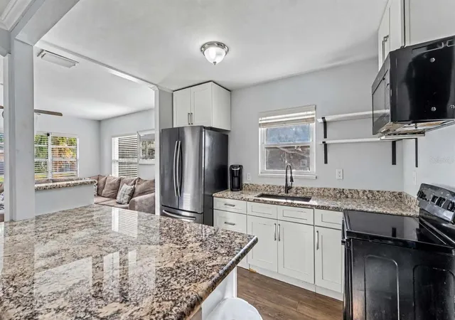 Photo 4 of Single family home for sale at 861 E Lowell St, Lakeland, FL 33805 | MLS# L4962891 | Listing updated on 2026-10-20