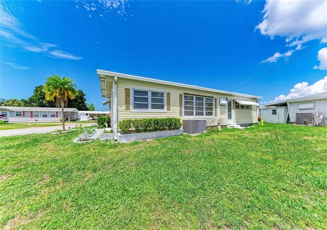 Photo 3 of Manufactured home for sale at 1781 Olympia Flds St, Sarasota, FL 34234 | MLS# A4697535 | Listing updated on 2026-09-13
