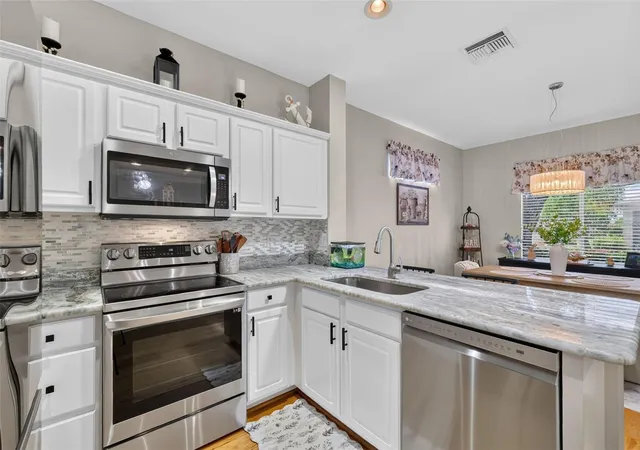 Photo 3 of Single family home for sale at 9524 SE 124th Loop, Summerfield, FL 34491 | MLS# OM727114 | Listing updated on 2026-09-15