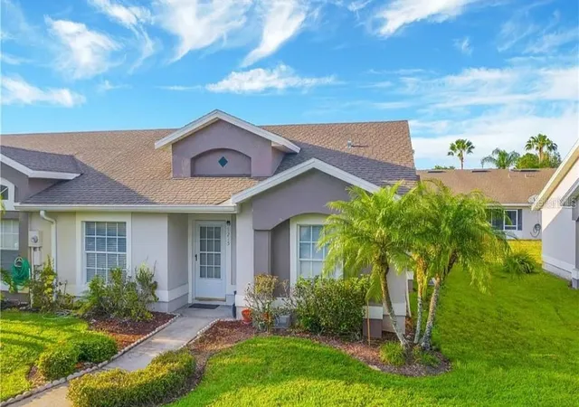 Photo 1 of Townhouse for sale at 1215 Barefoot Bay Dr, Orlando, FL 32824 | MLS# O6419010 | Listing updated on 2026-09-15