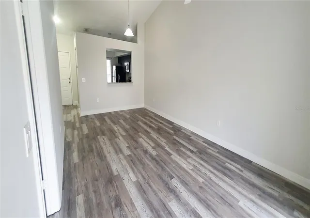 Photo 3 of Townhouse for sale at 1215 Barefoot Bay Dr, Orlando, FL 32824 | MLS# O6419010 | Listing updated on 2026-09-15