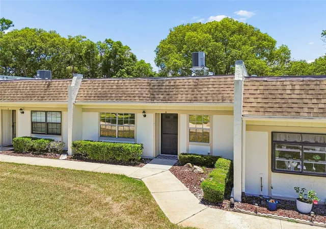 Photo 1 of Condo for sale at 11340 Carriage Hl Dr #4, Port Richey, FL 34668 | MLS# W7886975 | Listing updated on 2026-10-03