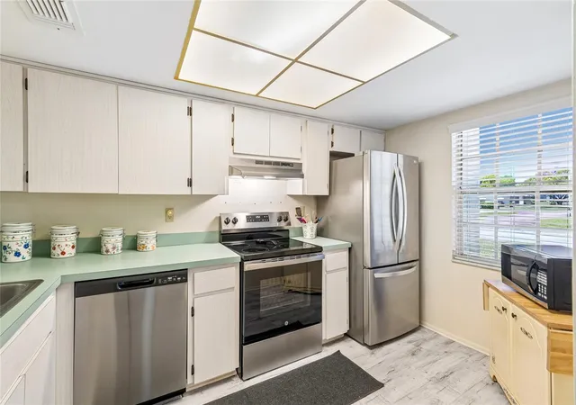Photo 2 of Condo for sale at 11340 Carriage Hl Dr #4, Port Richey, FL 34668 | MLS# W7886975 | Listing updated on 2026-10-03