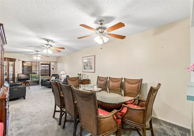 Photo 3 of Condo for sale at 11340 Carriage Hl Dr #4, Port Richey, FL 34668 | MLS# W7886975 | Listing updated on 2026-10-03
