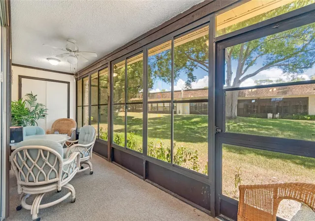 Listing Photo 5 - Condo for sale in building located at 11340 Carriage Hl Dr, PORT RICHEY, FL 34668 - Unit #4