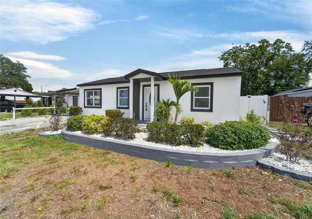 Photo 4 of Single family home for sale at 4711 W Lawn Ave, Tampa, FL 33611 | MLS# TB8522165 | Listing updated on 2026-09-12