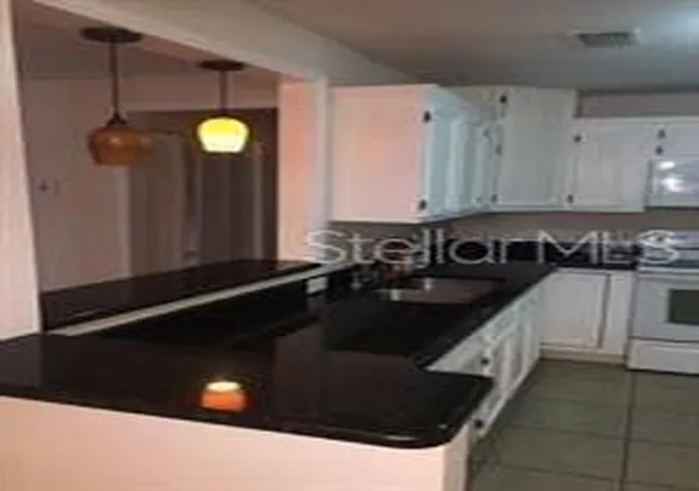 Photo 3 of Condo for sale at 4166 Versailles Dr #4166D, Orlando, FL 32808 | MLS# S5152476 | Listing updated on 2026-09-14