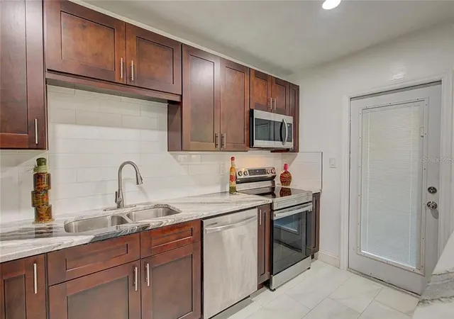 Photo 4 of Single family home for sale at 1008 Chester Dr, Clearwater, FL 33756 | MLS# TB8522980 | Listing updated on 2026-09-15