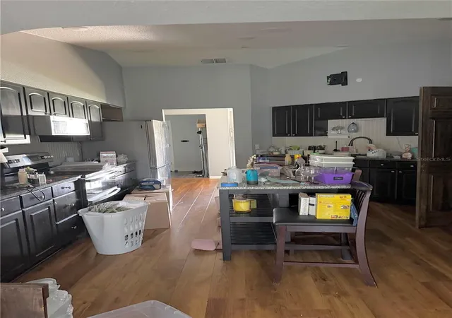 Photo 2 of Single family home for sale at 613 Berkley Pointe Pass, Auburndale, FL 33823 | MLS# TB8523405 | Listing updated on 2026-09-22