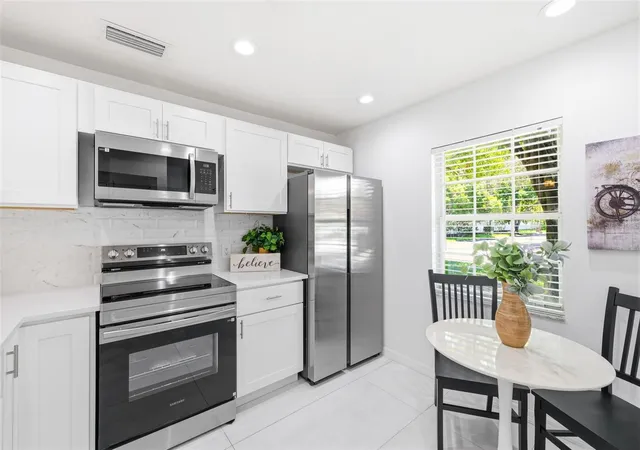 Photo 3 of Condo for sale at 5265 E Bay Dr #114, Clearwater, FL 33764 | MLS# TB8523512 | Listing updated on 2026-09-11