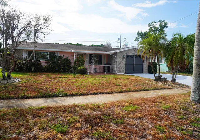 Photo 2 of Single family home for sale at 1248 Ermine Dr, Holiday, FL 34690 | MLS# TB8523522 | Listing updated on 2026-09-26
