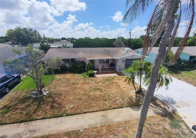 Photo 3 of Single family home for sale at 1248 Ermine Dr, Holiday, FL 34690 | MLS# TB8523522 | Listing updated on 2026-09-26
