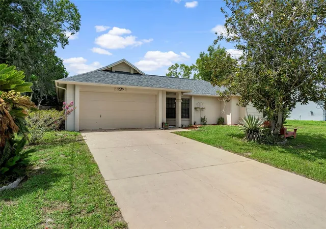 Photo 1 of Single family home for sale at 14058 Sullivan St, Spring Hill, FL 34609 | MLS# TB8523737 | Listing updated on 2026-10-11