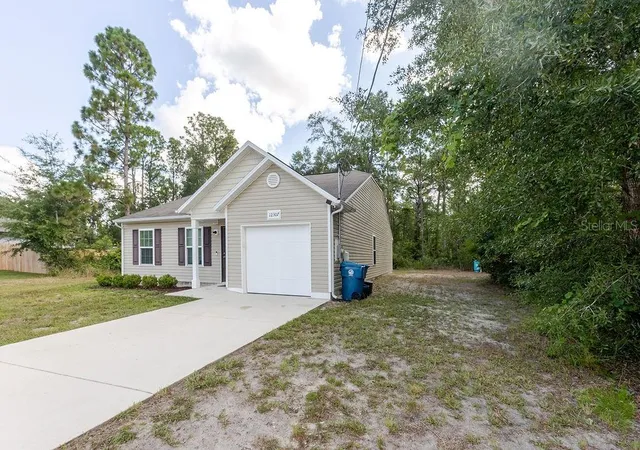 Photo 3 of Single family home for sale at 12307 Millington Ave, Weeki Wachee, FL 34614 | MLS# TB8523835 | Listing updated on 2026-09-14