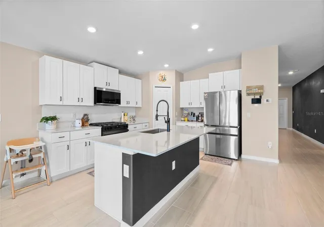 Photo 2 of Single family home for sale at 13608 Sunset Sapphire Ct, Parrish, FL 34219 | MLS# A4698417 | Listing updated on 2026-10-24