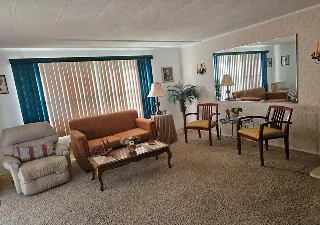 Photo 4 of Manufactured home for sale at 104 Ixora Way, Leesburg, FL 34748 | MLS# G5114432 | Listing updated on 2026-09-10