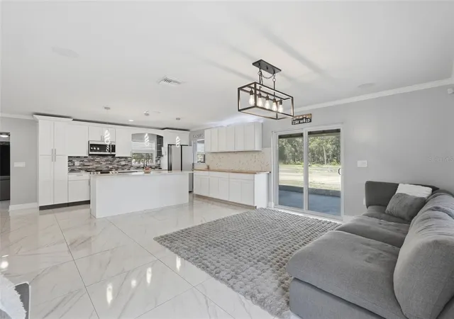 Photo 3 of Single family home for sale at 16700 Auburndale Ln, Spring Hill, FL 34610 | MLS# W7887259 | Listing updated on 2026-10-01