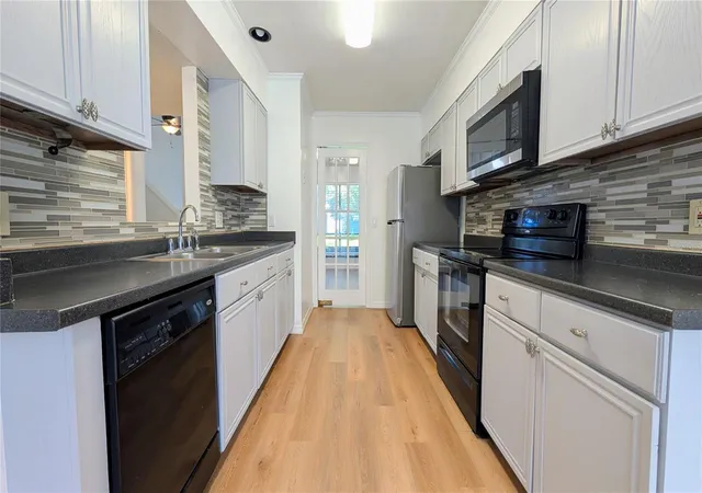 Photo 3 of Condo for sale at 4424 Dunwoody Pl #13, Orlando, FL 32808 | MLS# O6421647 | Listing updated on 2026-09-10
