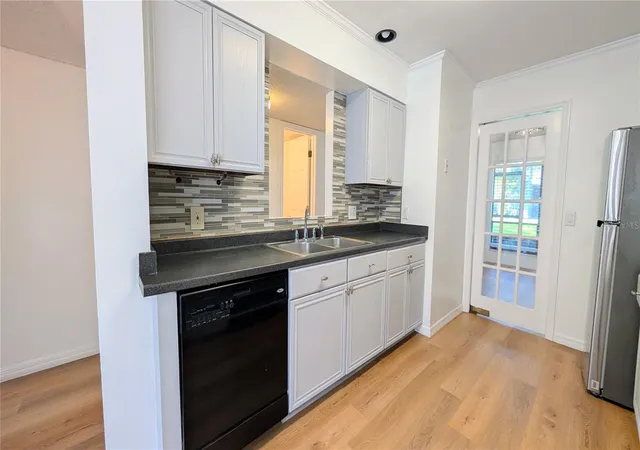Photo 4 of Condo for sale at 4424 Dunwoody Pl #13, Orlando, FL 32808 | MLS# O6421647 | Listing updated on 2026-09-10