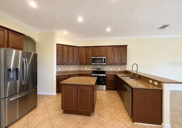 Photo 3 of Single family home for sale at 12419 Hammock Hl Dr, Clermont, FL 34711 | MLS# TB8526492 | Listing updated on 2026-09-14
