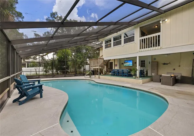 Photo 3 of Single family home for sale at 1410 Riverside Dr, Tarpon Springs, FL 34689 | MLS# W7887403 | Listing updated on 2026-09-10