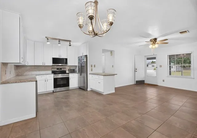 Photo 3 of Single family home for sale at 5010 Stolls Ave, Tampa, FL 33615 | MLS# W7887408 | Listing updated on 2026-09-12