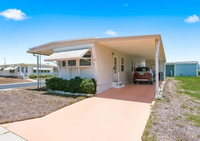 Photo 2 of Manufactured home for sale at 39820 Us Hwy 19 N #67, Tarpon Springs, FL 34689 | MLS# TB8526637 | Listing updated on 2026-09-14
