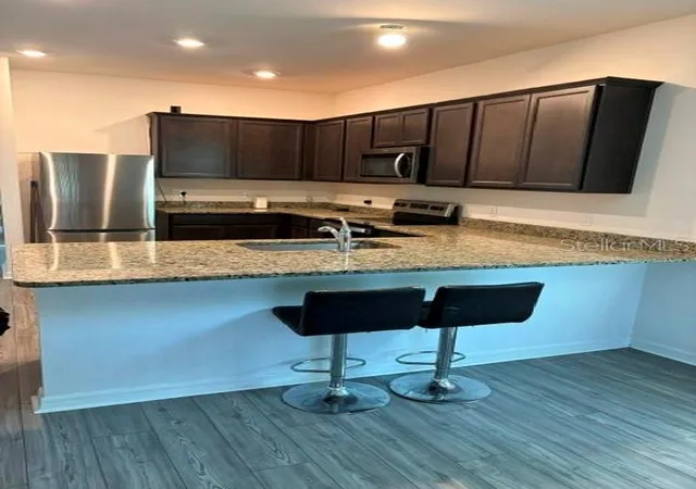 Photo 1 of Single family home for sale at 2119 NW 23rd Terrace, Cape Coral, FL 33993 | MLS# O6423163 | Listing updated on 2026-09-23