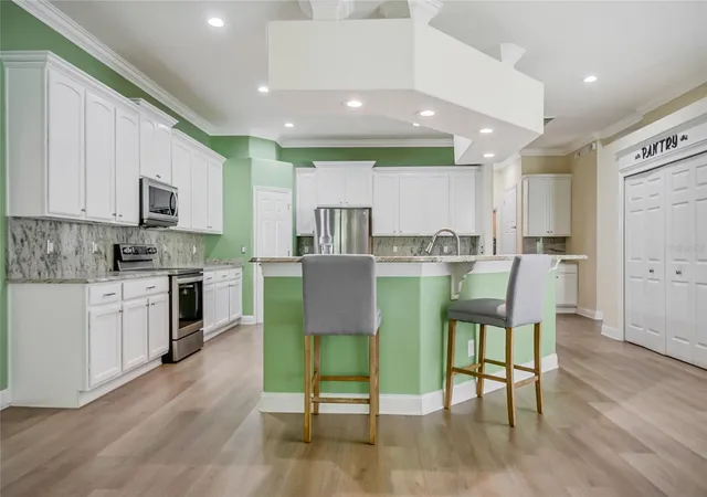 Photo 4 of Single family home for sale at 8615 Warwick Shore Xing, Orlando, FL 32829 | MLS# O6423218 | Listing updated on 2026-09-22