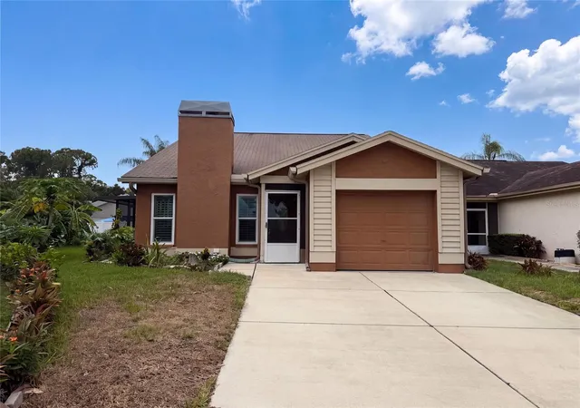 Photo 1 of Single family home for sale at 11648 Hidden Holw Cir, Tampa, FL 33635 | MLS# O6424056 | Listing updated on 2026-10-07