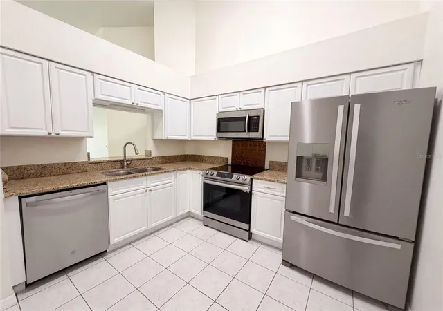 Photo 2 of Single family home for sale at 11648 Hidden Holw Cir, Tampa, FL 33635 | MLS# O6424056 | Listing updated on 2026-10-07