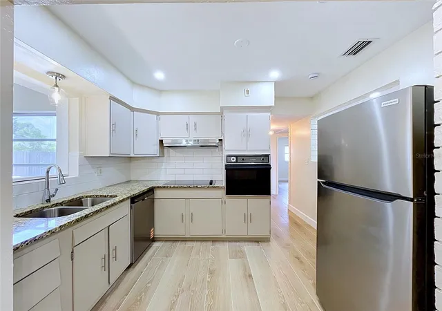 Photo 3 of Single family home for sale at 9813 51st Avenue N, St Petersburg, FL 33708 | MLS# TB8528371 | Listing updated on 2026-09-11