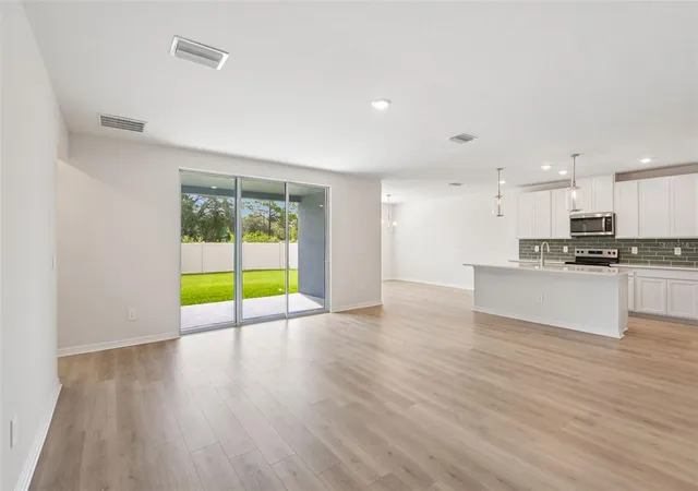 Photo 4 of Single family home for sale at 14152 Harvest Pines Ln, Hudson, FL 34669 | MLS# TB8528593 | Listing updated on 2026-09-14