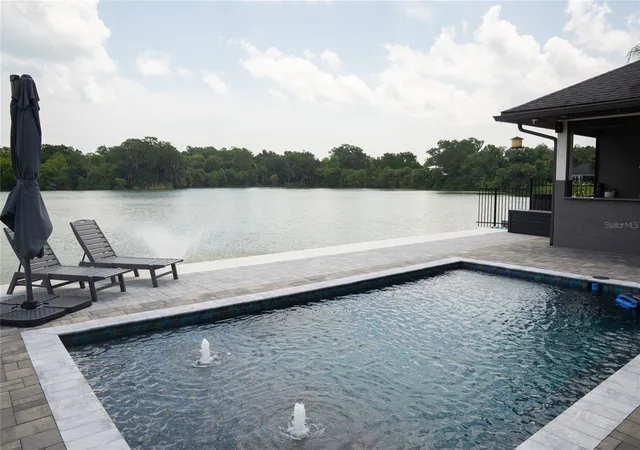 Photo 1 of Single family home for sale at 995 Stacy Ln, New Smyrna Beach, FL 32168 | MLS# O6424542 | Listing updated on 2026-10-10