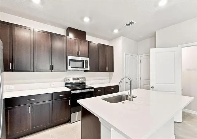 Photo 3 of Townhouse for sale at 1132 Wild Crst Ln, Daytona Beach, FL 32117 | MLS# TB8529024 | Listing updated on 2026-09-23