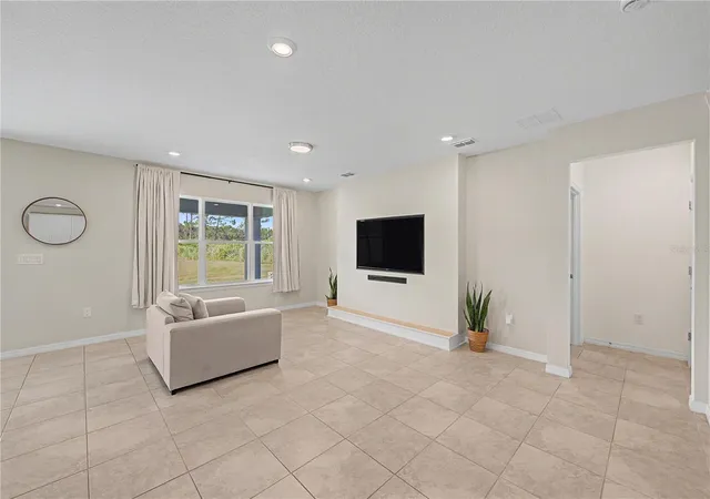 Photo 4 of Single family home for sale at 3891 Capri Coast Dr, Plant City, FL 33565 | MLS# TB8529059 | Listing updated on 2026-10-09