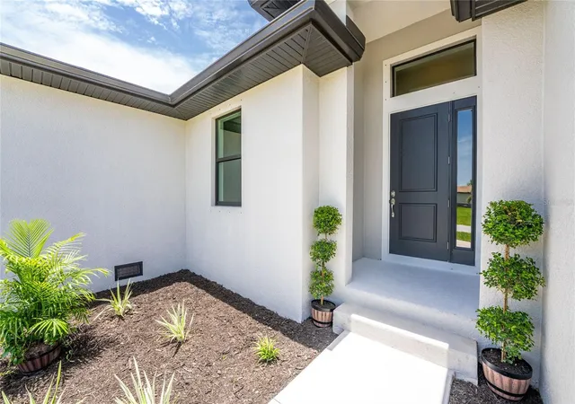 Photo 2 of Single family home for sale at 9590 Honeymoon Dr, Port Charlotte, FL 33981 | MLS# C7528442 | Listing updated on 2026-09-11