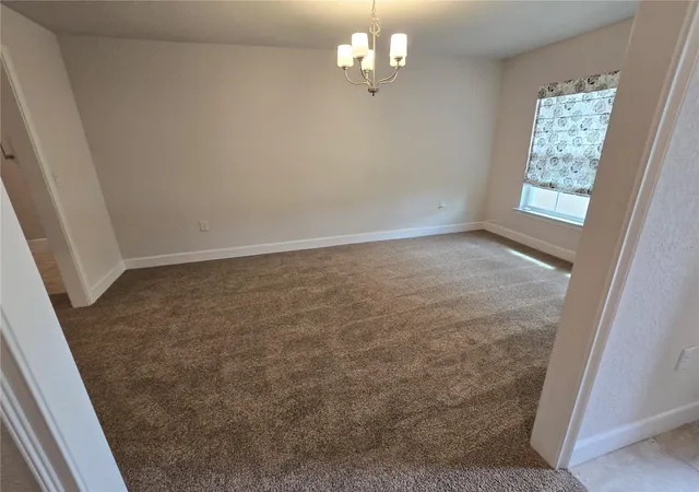 Photo 3 of Single family home for sale at 825 W Hallam Dr, Dunnellon, FL 34434 | MLS# O6425699 | Listing updated on 2026-09-25