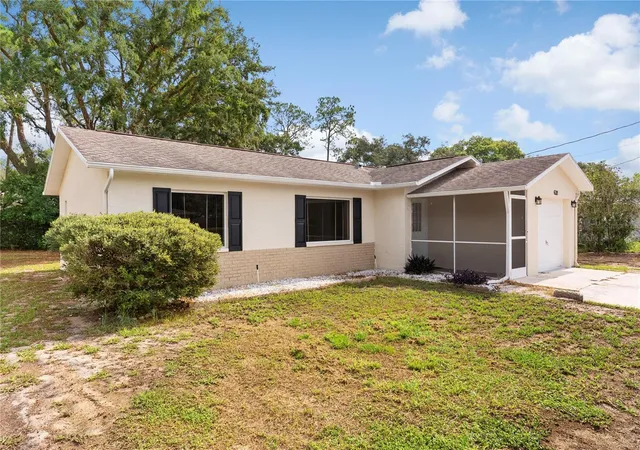 Photo 3 of Single family home for sale at 6321 Piedmont Dr, Spring Hill, FL 34606 | MLS# TB8530154 | Listing updated on 2026-09-11