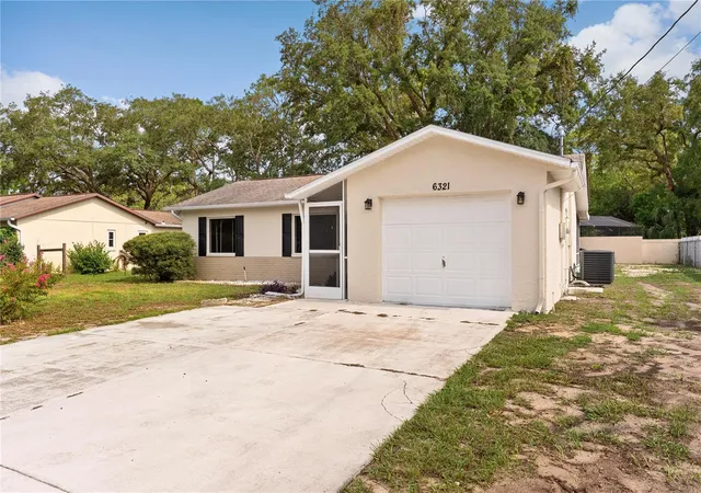 Photo 3 of Single family home for sale at 6321 Piedmont Dr, Spring Hill, FL 34606 | MLS# TB8530154 | Listing updated on 2026-09-11