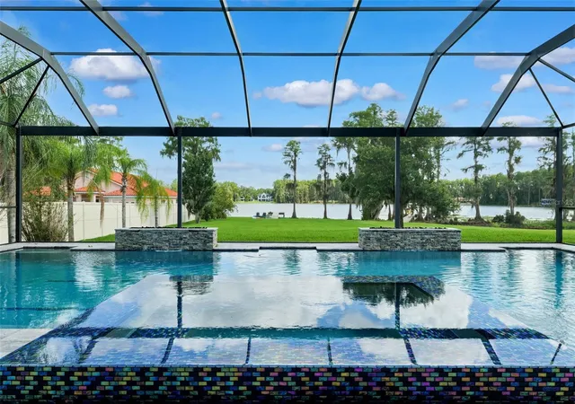 Photo 2 of Single family home for sale at 5167 Lakecastle Dr, Tampa, FL 33624 | MLS# TB8530952 | Listing updated on 2026-09-15