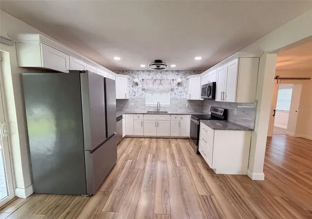 Photo 3 of Single family home for sale at 2242 E Dana Dr, Deltona, FL 32738 | MLS# O6426840 | Listing updated on 2026-10-08
