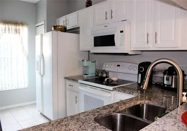 Photo 3 of Condo for sale at 1247 Redondo Way #1247, Wesley Chapel, FL 33543 | MLS# TB8531521 | Listing updated on 2026-09-15