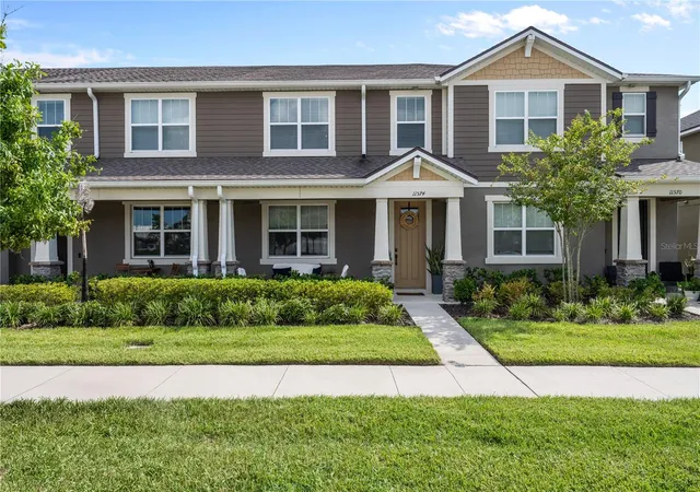 Photo 1 of Townhouse for sale at 11574 Buoy Point Pl, Orlando, FL 32832 | MLS# O6427162 | Listing updated on 2026-09-29