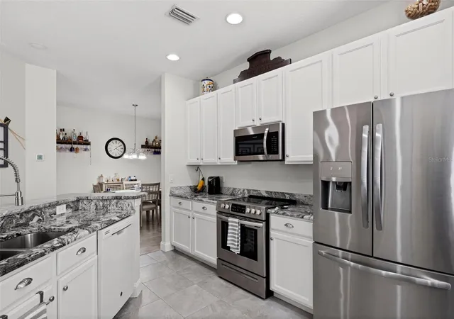 Photo 2 of Single family home for sale at 10818 Ashford Oaks Dr, Tampa, FL 33625 | MLS# TB8531750 | Listing updated on 2026-09-24